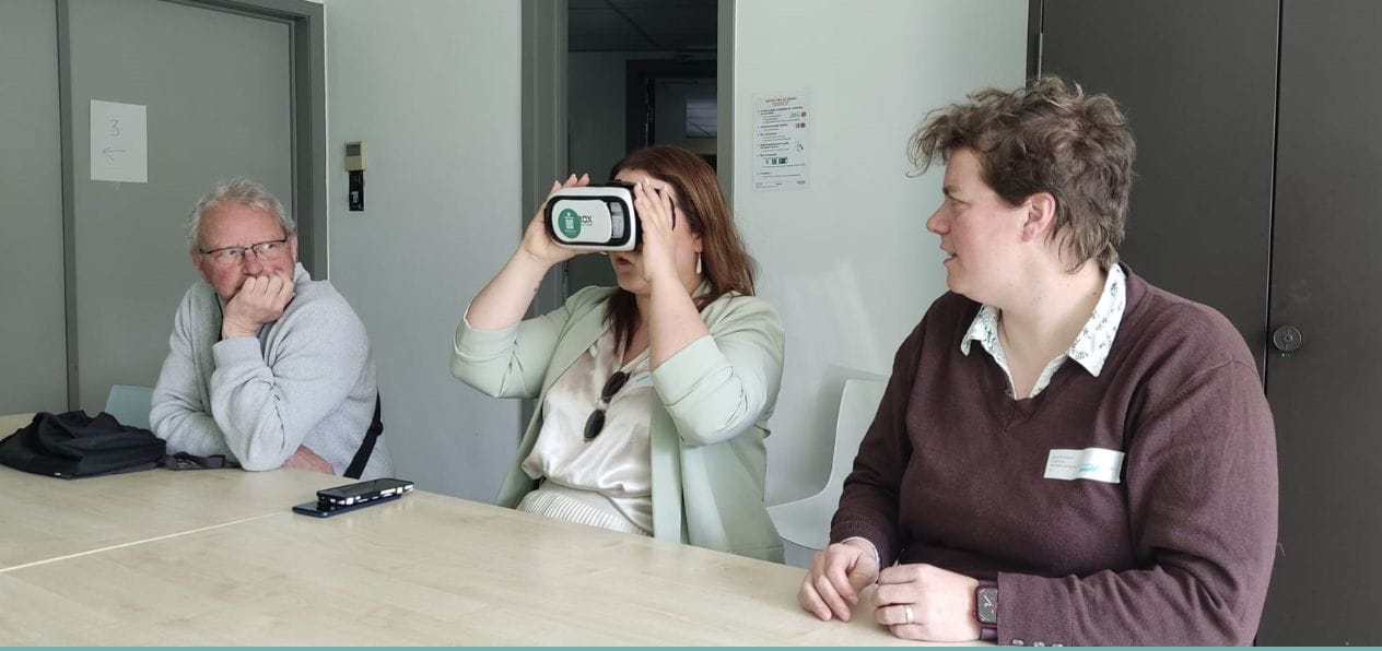 A participant using a VR headset during the Machelen Empathy Lab
